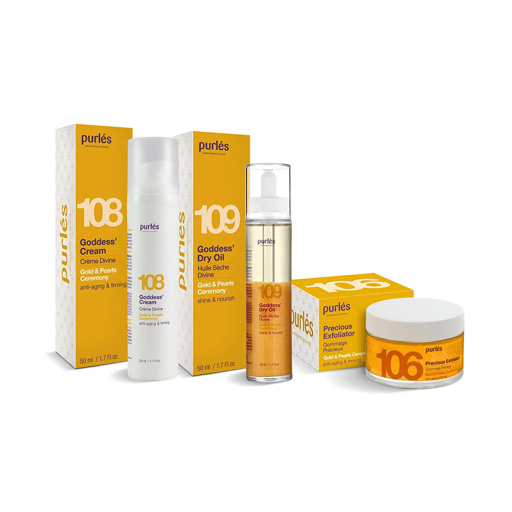 Vier Hautpflegeprodukte von Purles, darunter Goddess' Cream, Goddess' Dry Oil und Precious Exfoliator, werden mit ihren passenden orangefarbenen und weißen Produktverpackungen ausgestellt.