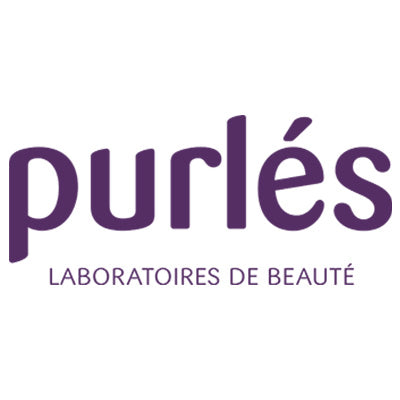 Das Bild zeigt das Logo von Purlés, mit Purlés in großen violetten Buchstaben über dem Schriftzug LABORATOIRES DE BEAUTÉ in kleineren violetten Buchstaben.