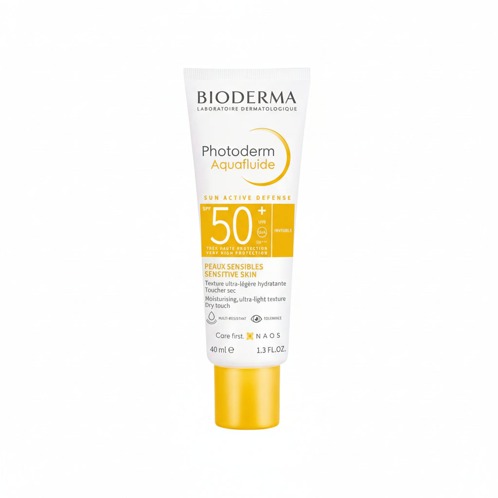 Eine 40 ml Tube Bioderma PHOTODERM AQUAFLUIDE LSF 50+ mattierendes Sonnenschutzmittel für empfindliche Haut, in weiß-gelbem Design, ungefärbt, von Bioderma.