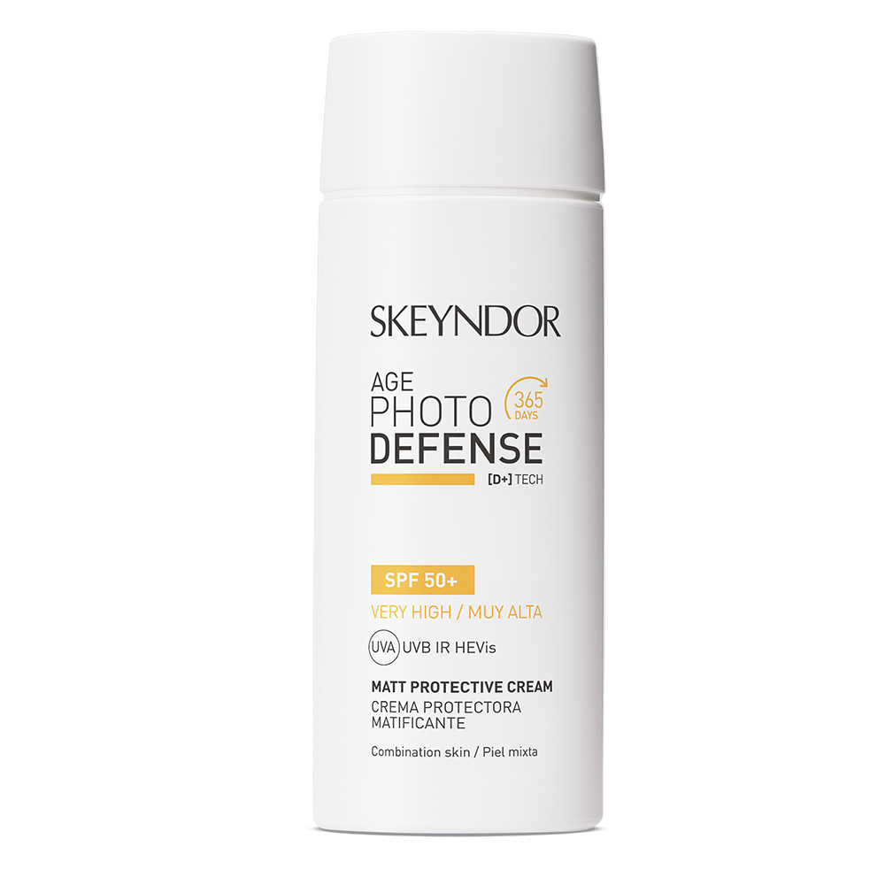 Skeyndor AGE PHOTO DEFENSE MATT PROTECTIVE CREAM SPF50+ in der weißen Flasche, für Mischhaut, bietet einen sehr hohen UVA-, UVB-, IR- und HEVis-Schutz.