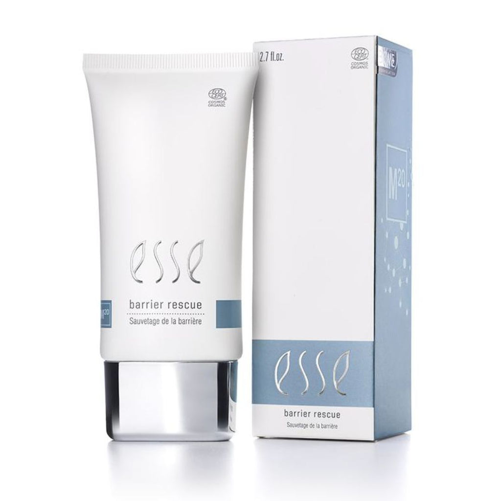 Eine Tube ESSE Skincare Barrier Rescue-Creme neben der aufrecht stehenden Produktverpackung, die zur Stärkung der Hautbarriere entwickelt wurde.
