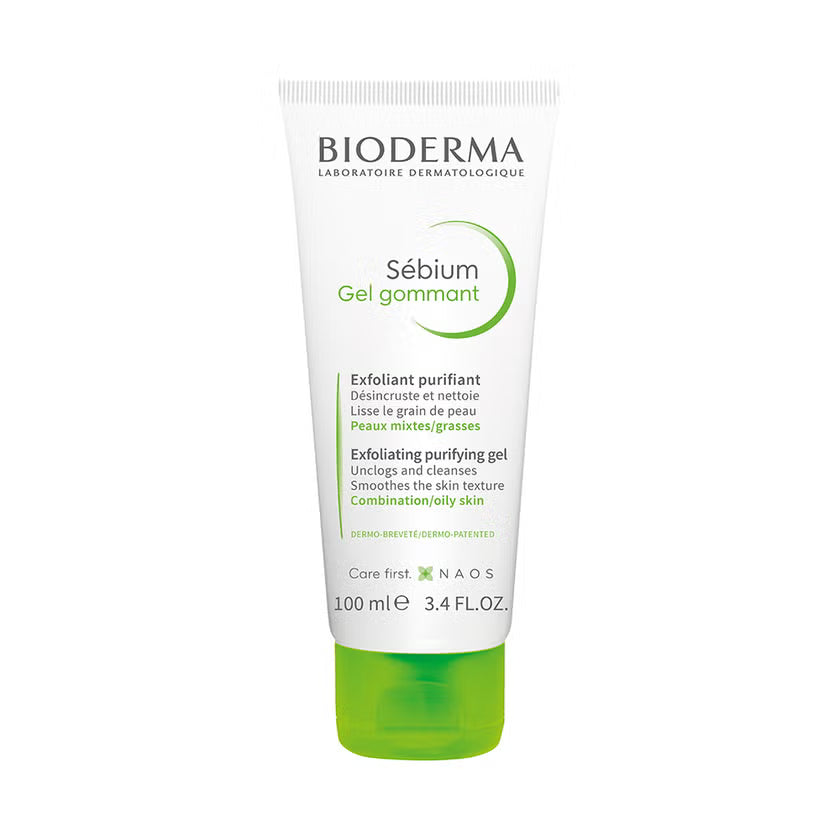 Weiße 100-ml-Tube Bioderma SÉBIUM GEL GOMMANT / Sanftes Peeling Peeling-Gel mit grünem Klappdeckel, für Mischhaut und fettige Haut, mit französischer, englischer und deutscher Beschriftung.